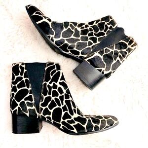 Urban Outfitters giraffe print booties.